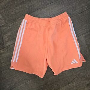 Adidas Orange Athletic Shorts with Signature Stripes